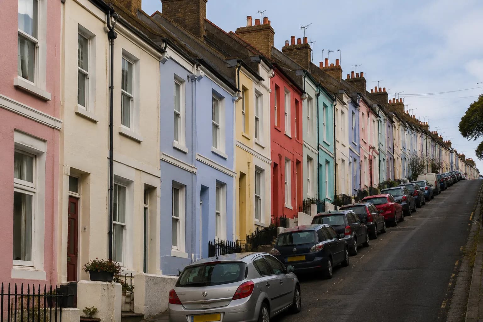 A row of colourful Victorian terraces on a Hanover hillside, Brighton