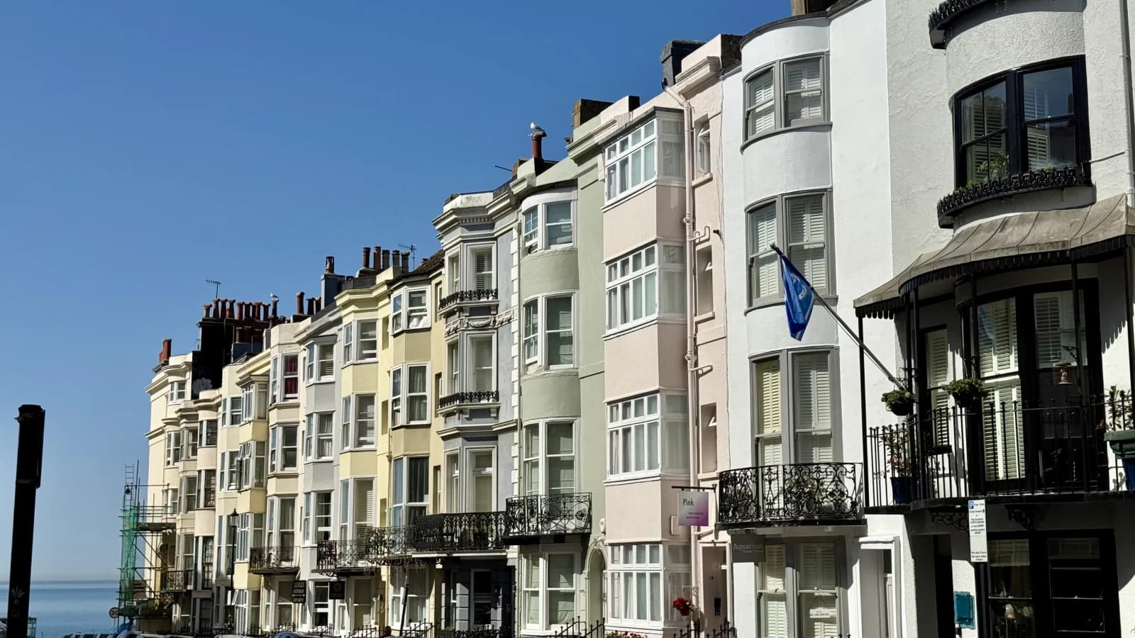 A row of pastel-painted Regency seafront terraces in Kemptown